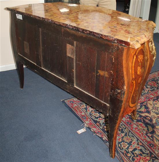 A Louis XV style fruitwood and ebony inlaid kingwood, tulipwood and marquetry commode, in the manner of Latz, W.4ft 1.5in. H.2ft 9in.